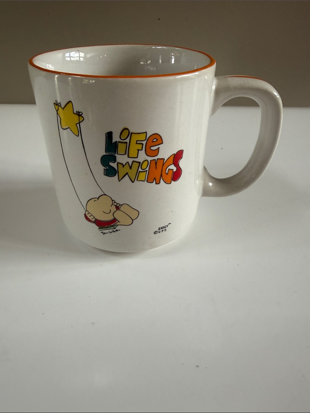 Ziggy Life Swings Cartoon Mug with Orange Rim